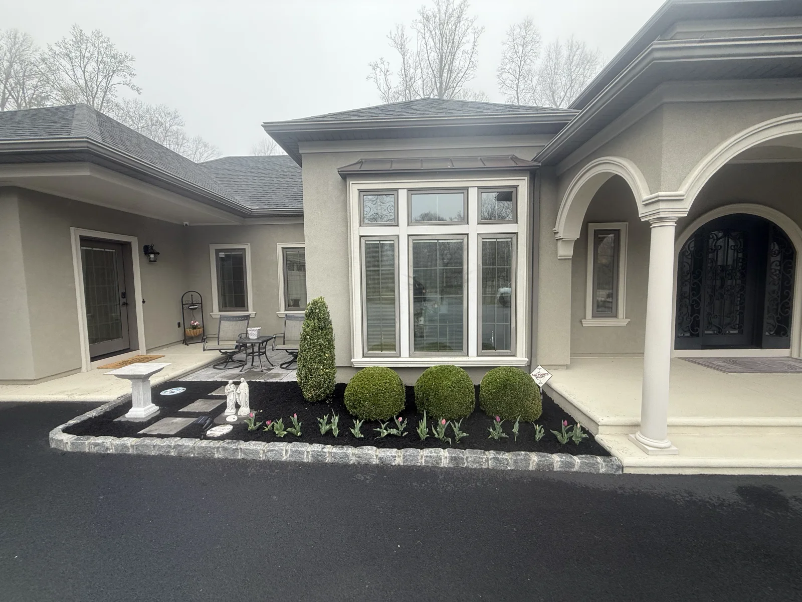 Fresh hedge trimming work with clean shrub lines